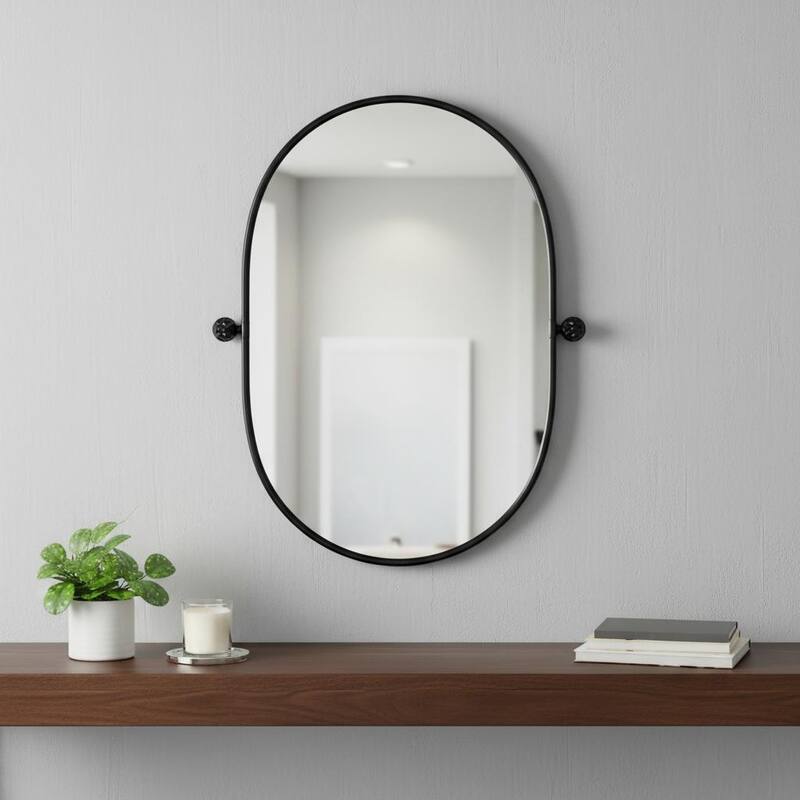HomeRoots 32" Black Aluminum Oval Adjustable Tilting Framed Accent Mirror - 23.00 in. x 32.00 in. x 1.56 in. - 23.00 in. x 32.00 in. x 1.56 in.