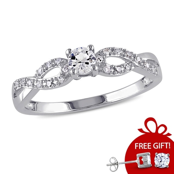 Miadora Sterling Silver Created White Sapphire and 1/10ct TDW Diamond Infinity Promise Ring. Opens flyout.