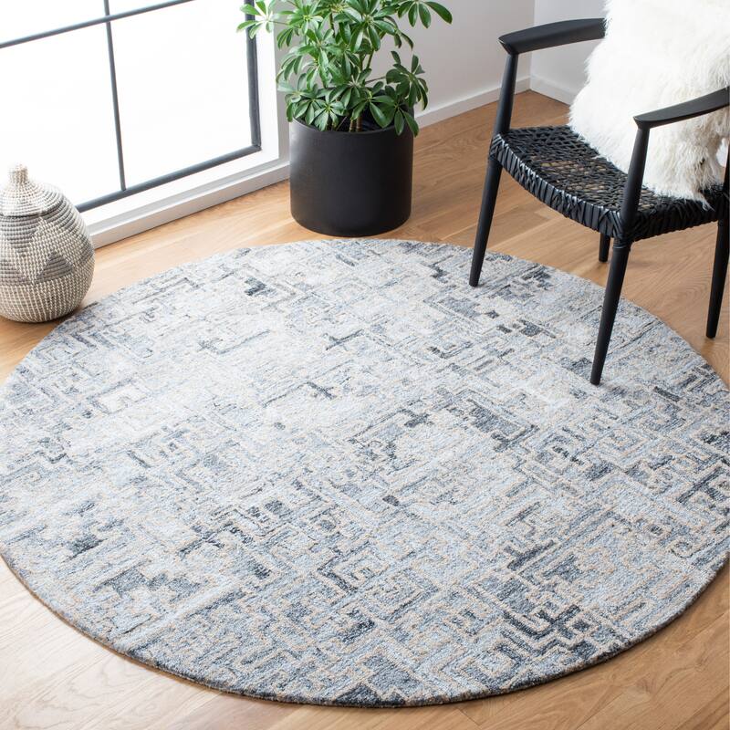 SAFAVIEH Handmade Abstract Sevgi Modern Rug - 6' Round - Ivory/Black
