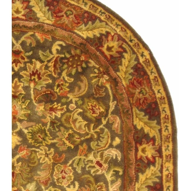 SAFAVIEH Handmade Antiquity Manerva Traditional Oriental Wool Rug - 4'6" x 6'6" Oval - Green/Gold