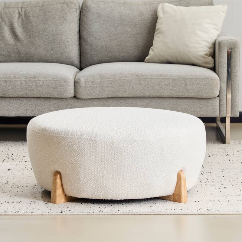 Roomfitters Round Boucle Ottoman with Splayed Rubber Wood Legs