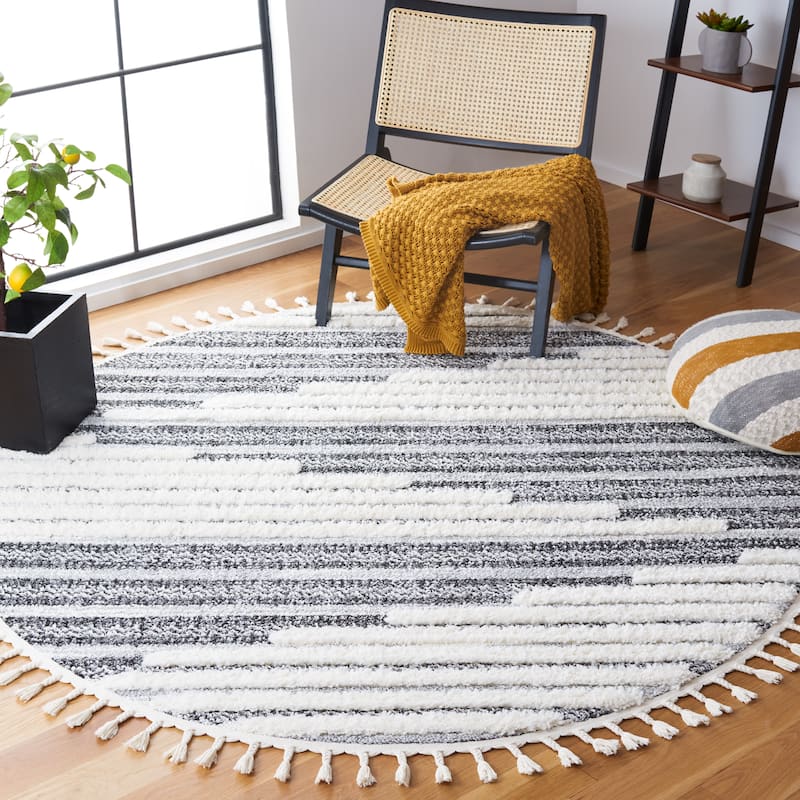 SAFAVIEH Moroccan Tassel Shag Elvia 2-inch Thick Rug - 6'7" Round - Dark Grey/Ivory