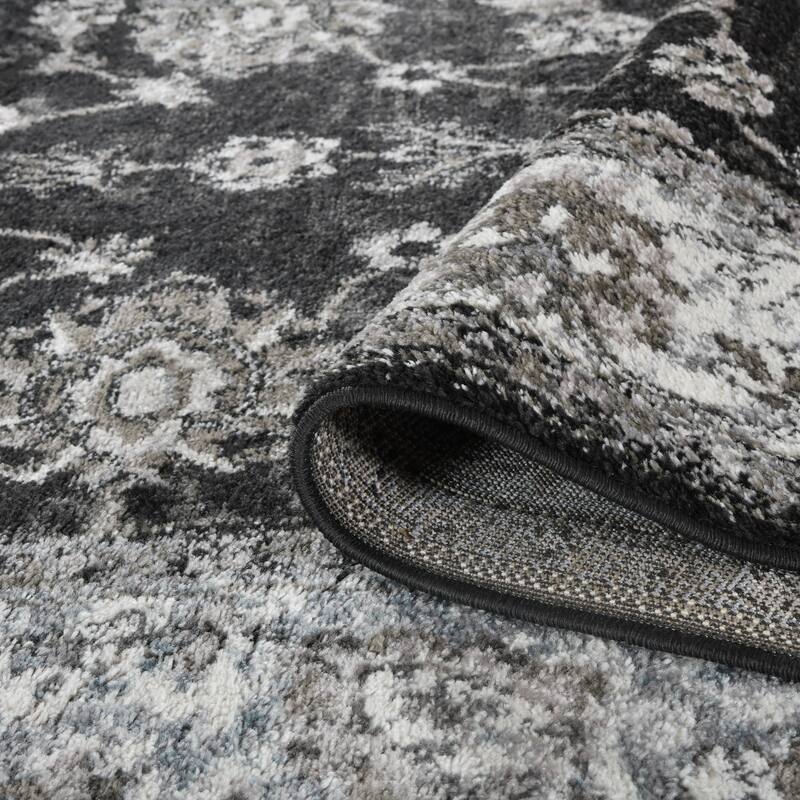 Aurelia Jiru Black Bordered Area Rug