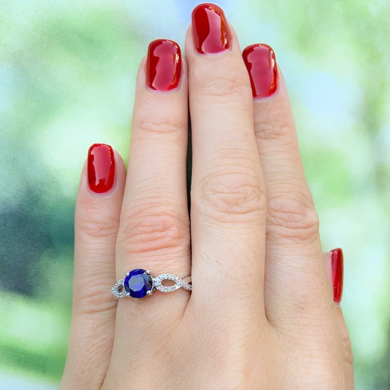 Miadora 10k White Gold Blue Sapphire and 1/10ct TDW Diamond Ring (G-H, I1-I2)