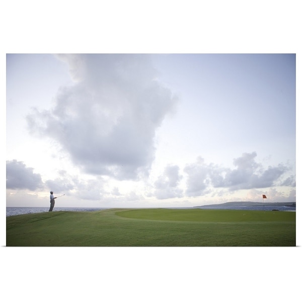"Man at golf course holding golf club, looking away" Poster Print