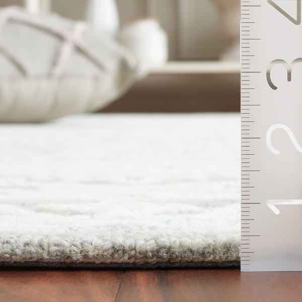 SAFAVIEH Handmade Ebony Aija Modern Wool Rug