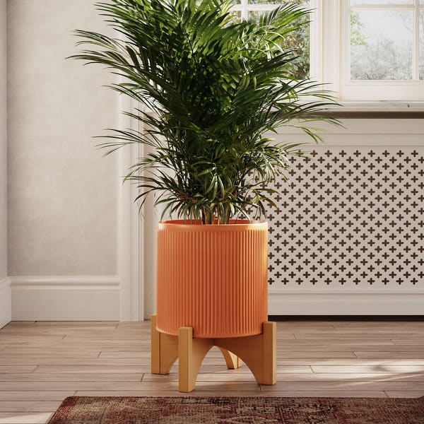 slide 2 of 8, Fluted Metal Planter Pot With Arch Wood Base - Terracotta Color 12.5"H x 9.75"W x 9.75"D