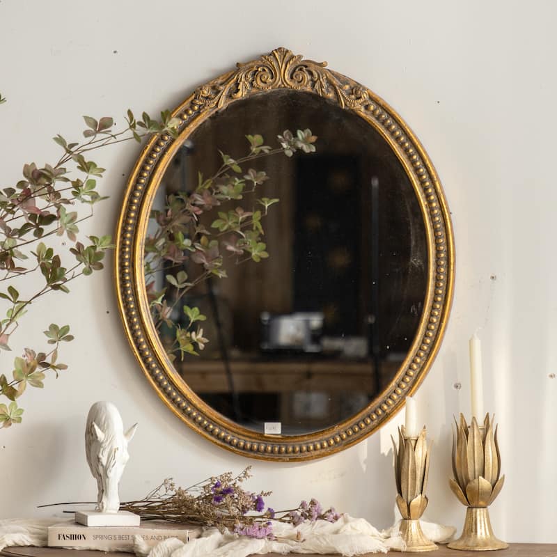 Elegant Oval Wall-mounted Decorative Mirror With Intricate Gilded Border
