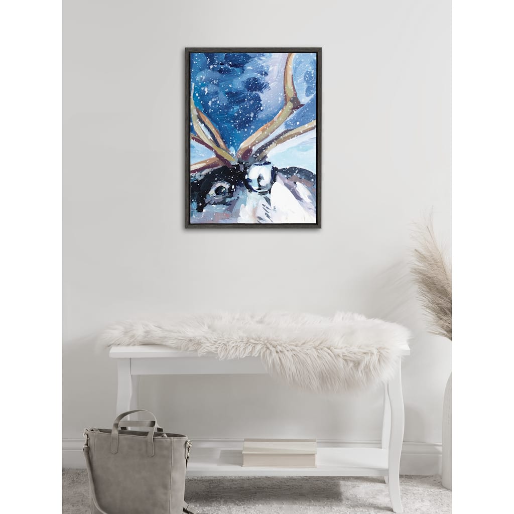 Kate and Laurel Sylvie Reindeer In Snow Framed Canvas by Rachel Christopoulos