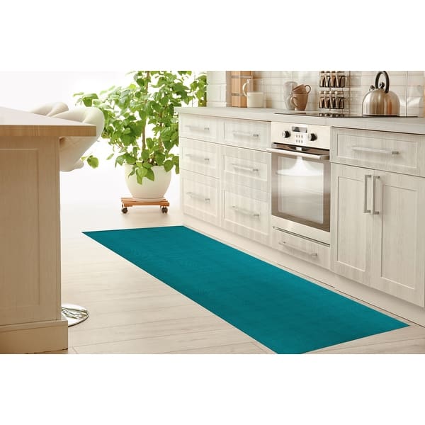 https://ak1.ostkcdn.com/images/products/is/images/direct/1dac03181906d424f50f237fdce9b1a12e961076/STITCHED-ZIG-ZAG-TRIBAL-TURQUOISE-Kitchen-Mat-by-Kavka-Designs.jpg?impolicy=medium