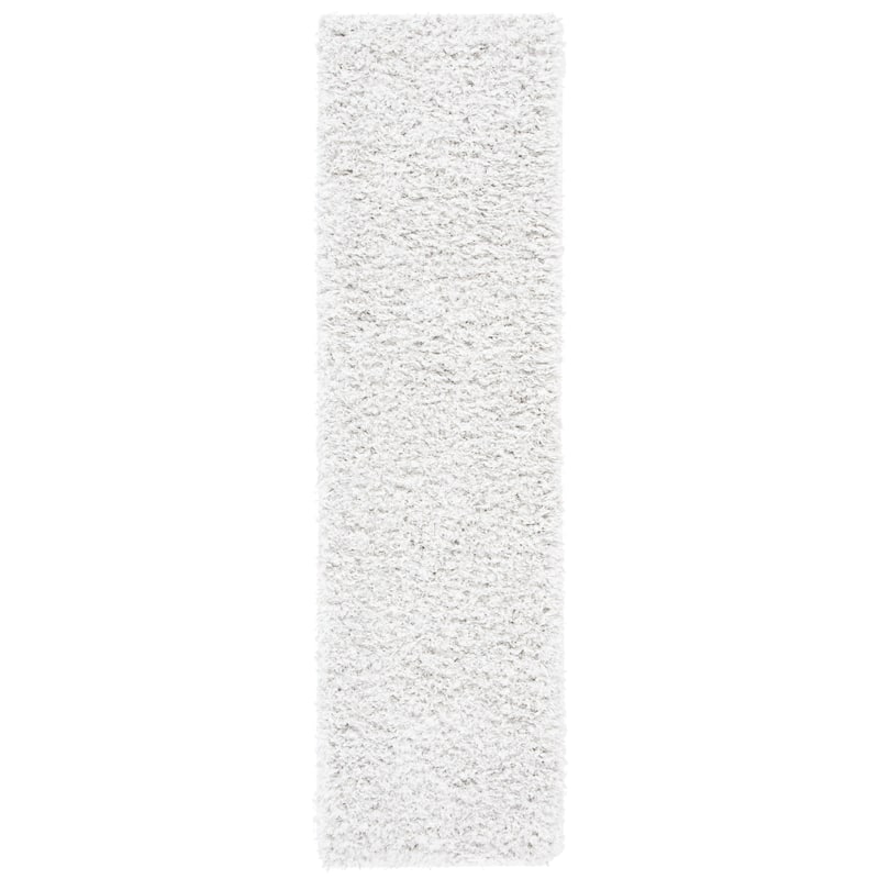 SAFAVIEH Flokati Vojsava Shag Solid Rug
