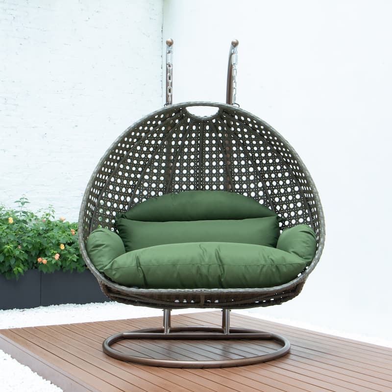 LeisureMod 2-Person Hanging Egg Swing Chair with Metal Stand - Handcrafted Beige Wicker, Patio Hammock Lounger with Cushions