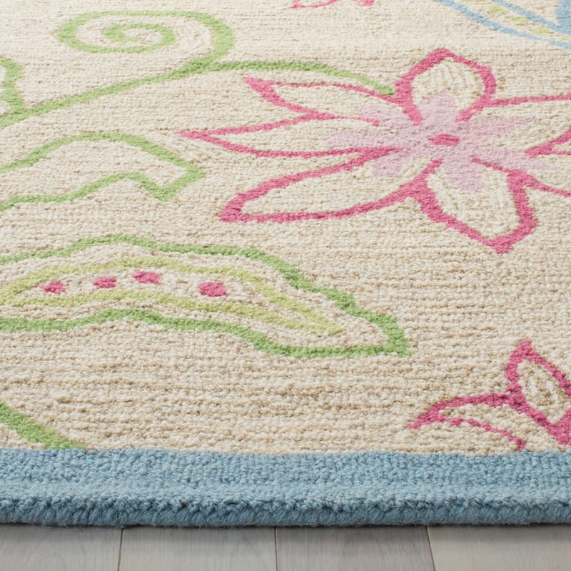 SAFAVIEH Handmade Kids Dayana Floral Wool Rug