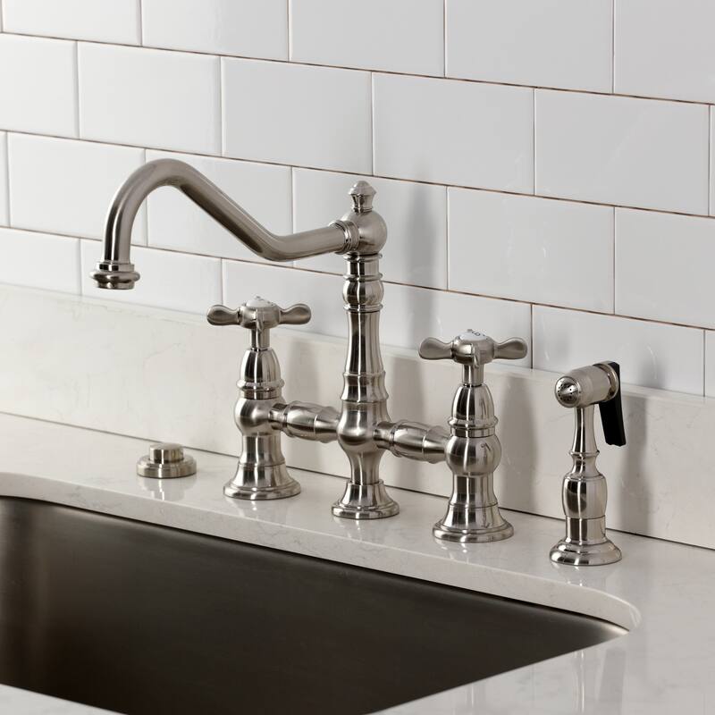 Kingston Brass Essex Two-Handle 4-Hole Deck Mount Bridge Kitchen Faucet with Brass Side Sprayer