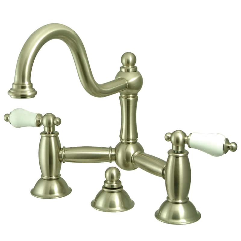 Kingston Brass Restoration Bridge Bathroom Faucet with Pop-Up Drain