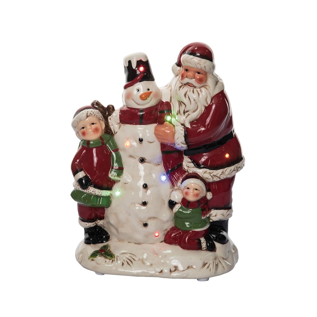 Transpac 11 in. Holiday Santa Child Snowman with Music
