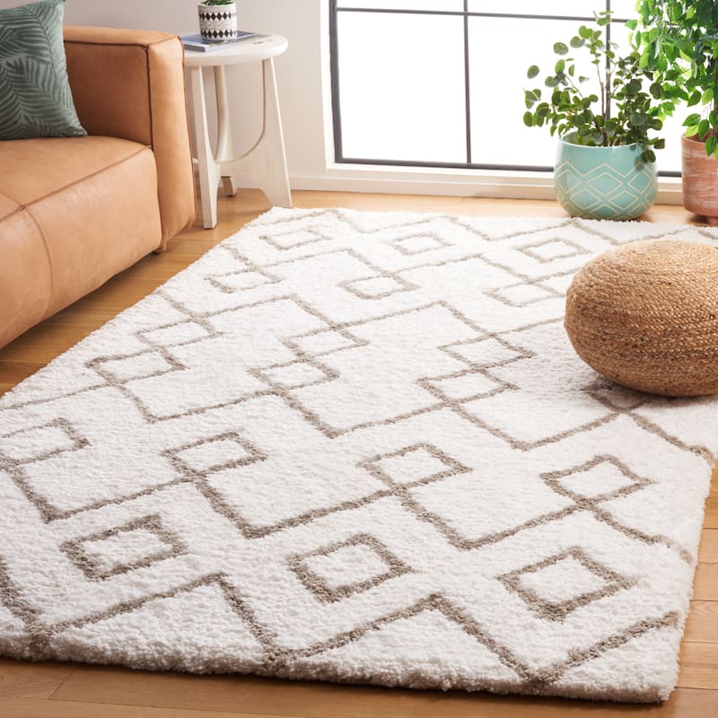 SAFAVIEH Handmade Toronto Shag Welmoet Polyester Rug