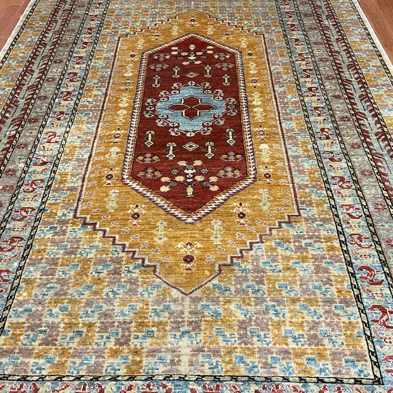 HERAT ORIENTAL Handmade Khotan Wool Rug - 6'1" x 9'6"