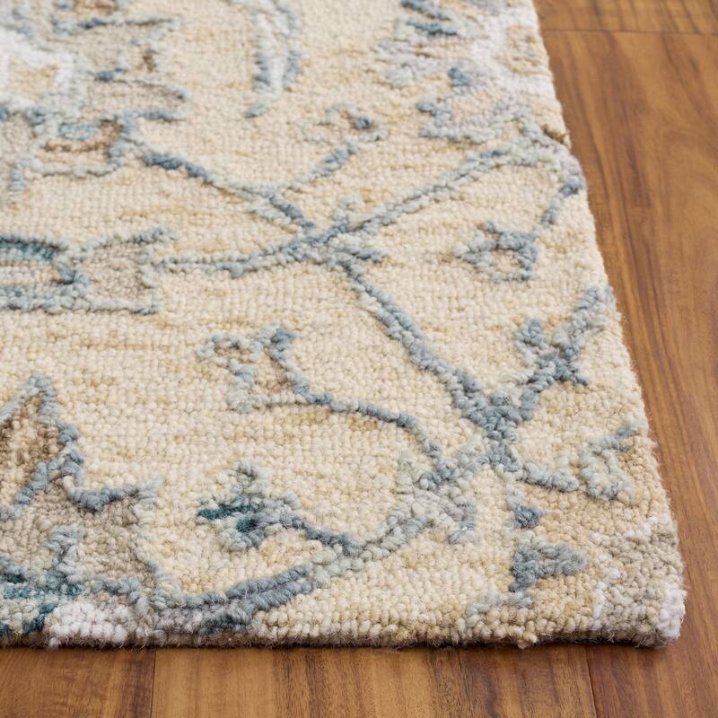 SAFAVIEH Handmade Metro Medrea Wool Rug
