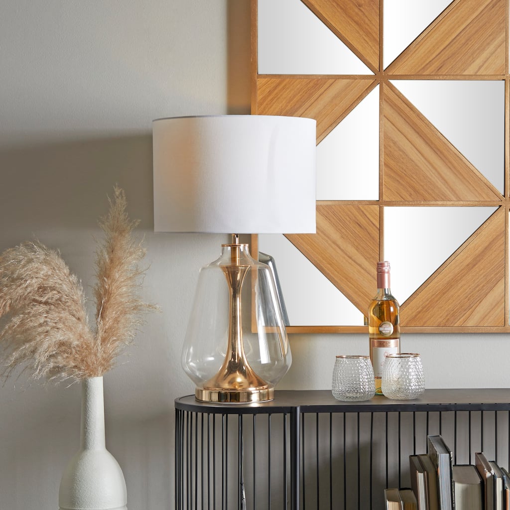 CosmoLiving by Cosmopolitan Gold Tempered Glass Transparent Base Table Lamp with Drum Shade