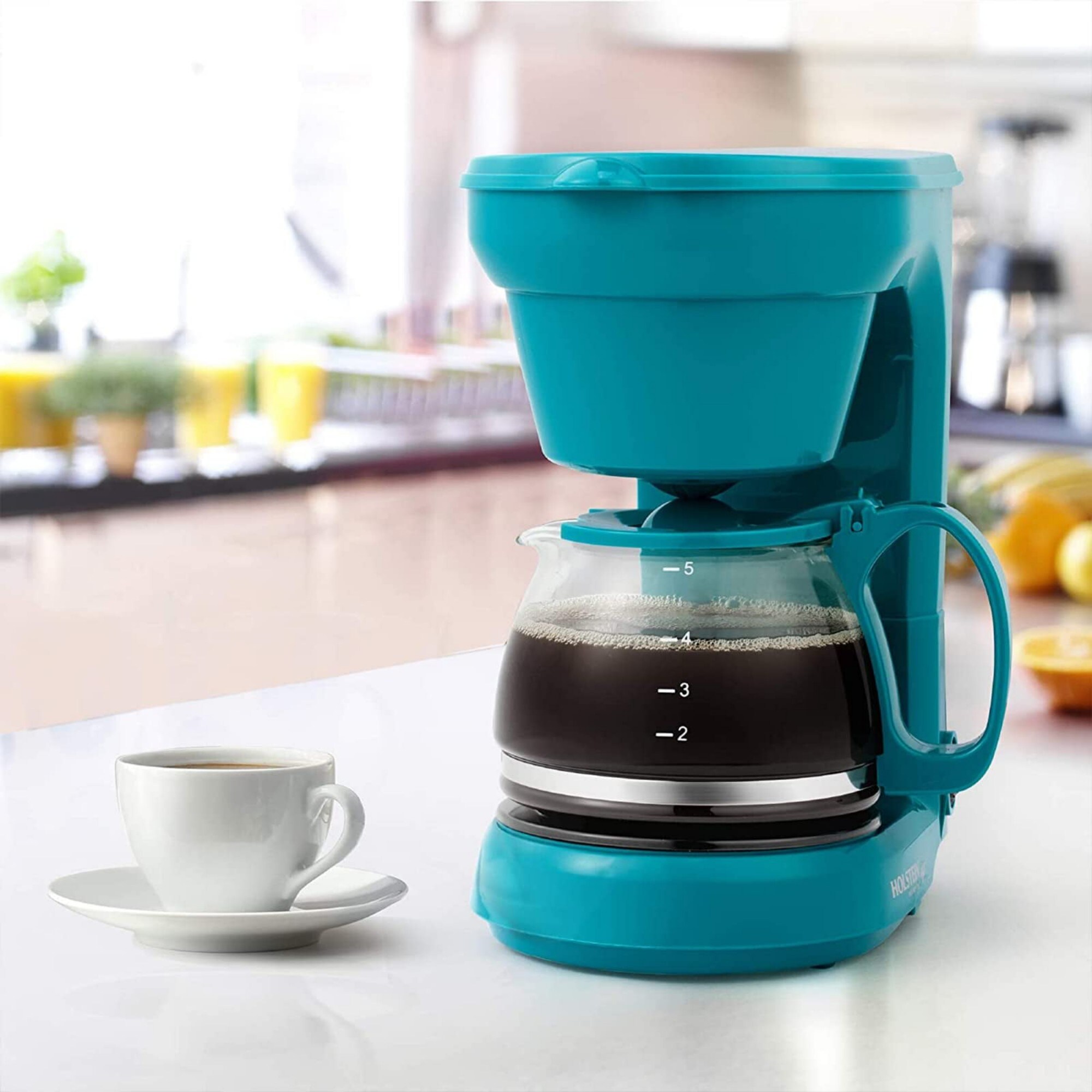 https://ak1.ostkcdn.com/images/products/is/images/direct/1e3484717a8117a50b7498783b2b2cbf694970b2/5CUP-Coffee-Maker---Space-Saving-Design%2C-Auto-Pause-and-Serve%2C-Removable-Filter-Basket%2C-BLACK.jpg