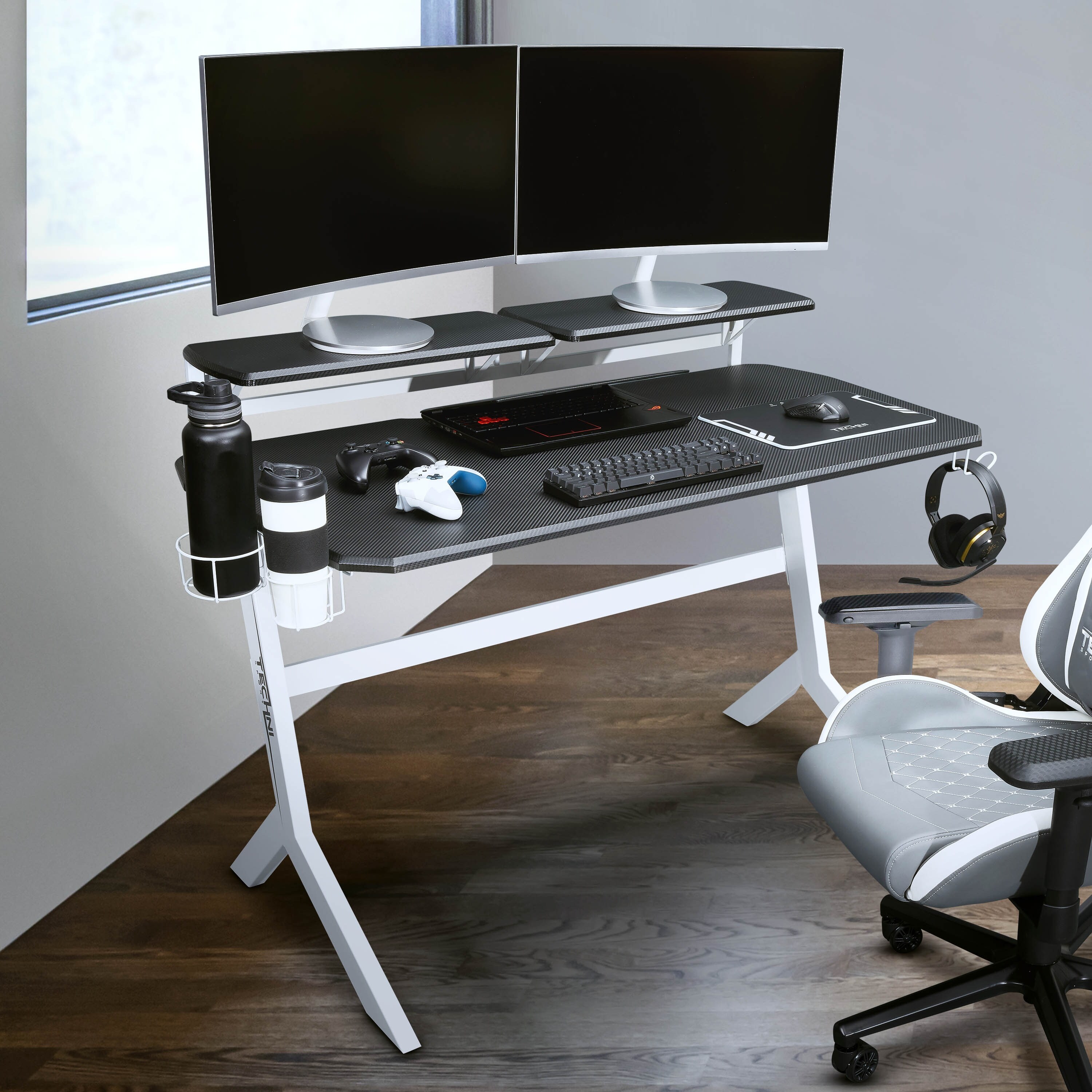 https://ak1.ostkcdn.com/images/products/is/images/direct/1e405ba9fef66950e23eed9bfbc3ffd21d919bab/Sport-Gaming-Desk-Two-Way-Computer-Desk-with-Elevated-Monitor-Stands-CD-Rack-Cup-Holder-%26-Accessories-Storage-Laptop-Workstation.jpg