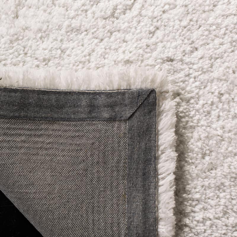 SAFAVIEH Handmade Glamour Shag Ammaria Casual Solid Polyester Rug