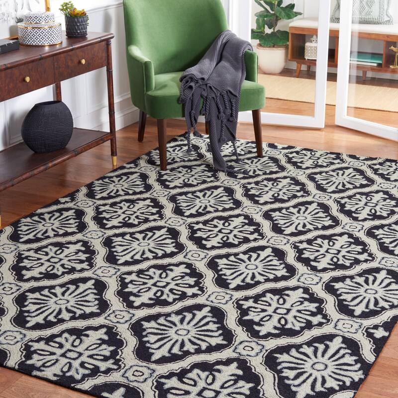 SAFAVIEH Handmade Easy Care Vaxhide Oriental Rug - 4' x 6' - Black