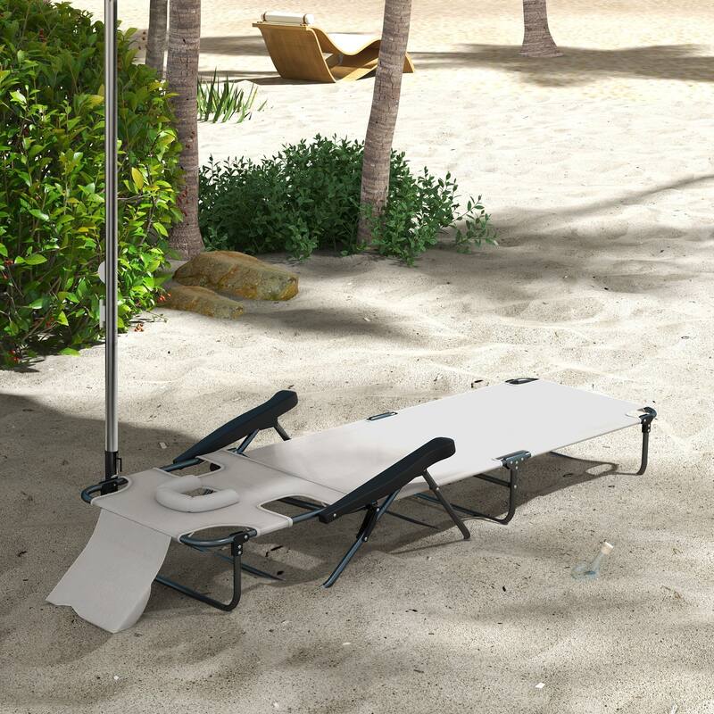 Folding sun loungers with face holes, arm slots and pillows