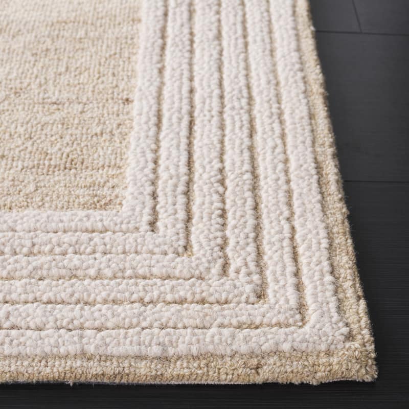 SAFAVIEH Handmade Ebony Cana Border Wool Rug