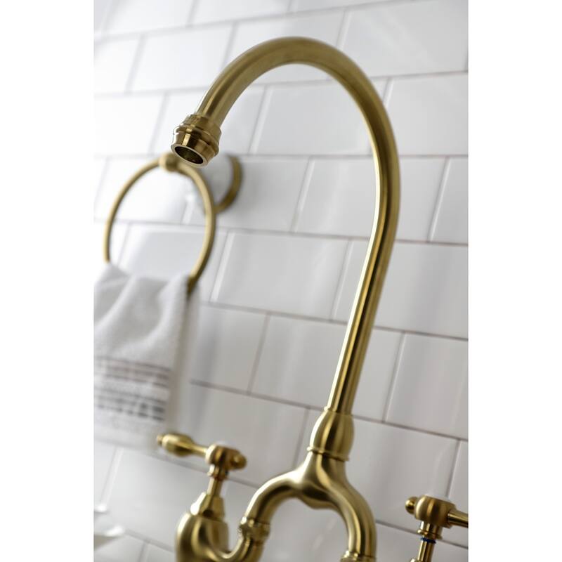 Kingston Brass Tudor Bridge Kitchen Faucet with Brass Sprayer