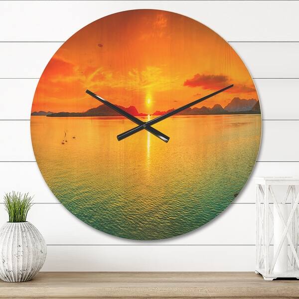 slide 2 of 9, Designart 'Sunset Panorama' Oversized Coastal Wall CLock 23 in. wide x 23 in. high