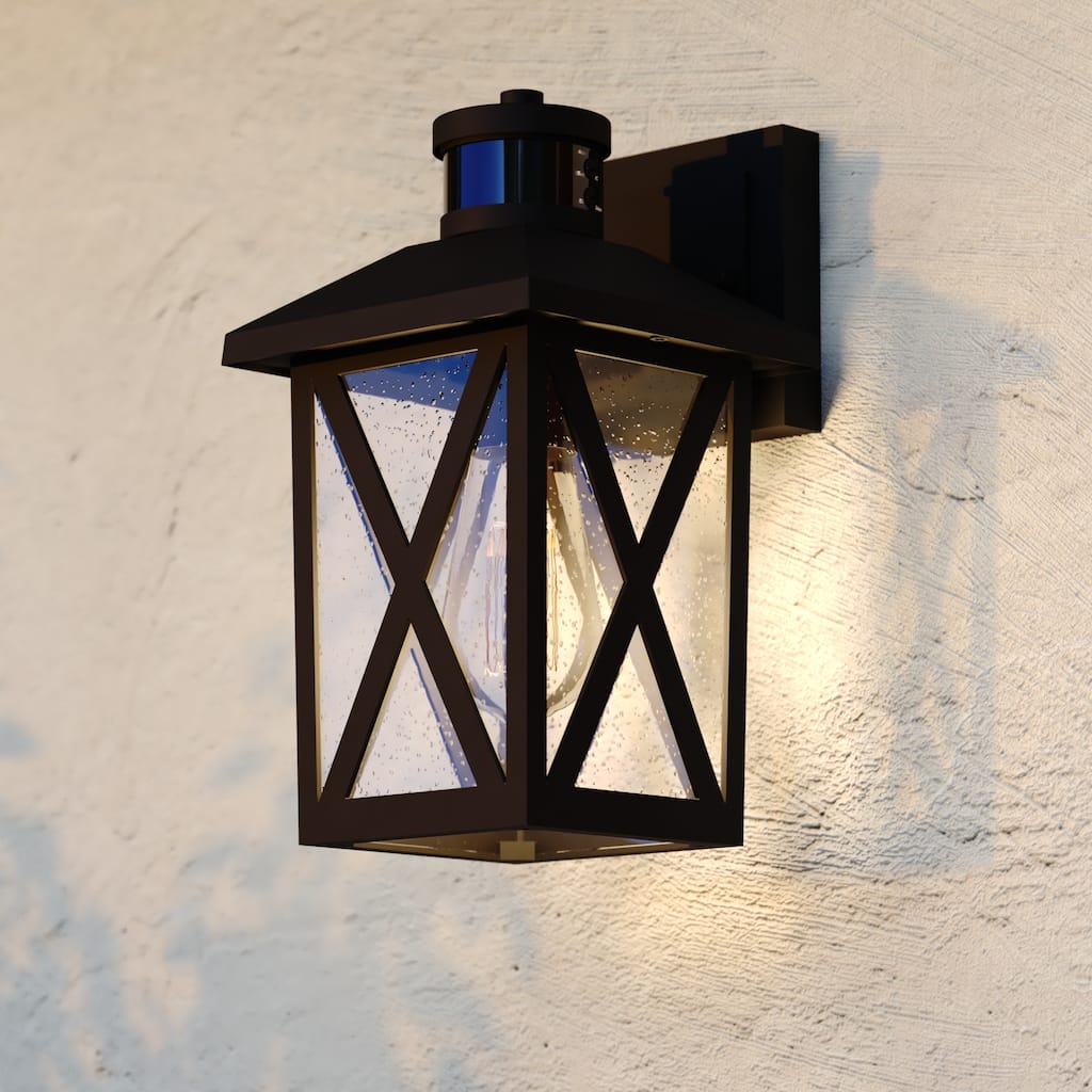 VAXCEL Rockford 11 in. H Motion Sensing Dusk to Dawn Outdoor Wall Sconce Light with Clear Seeded Glass Shade
