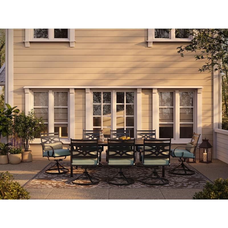 Hanover Montclair 9-Piece Dining Set in Ocean Blue with 8 Swivel Rockers and a 42-In. x 84-In. Table