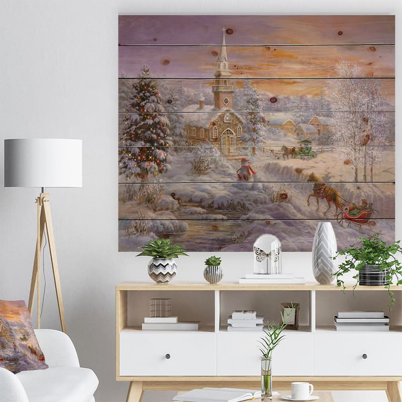 Designart 'Holiday Worship winter scene with sleigh and church' Print on Natural Pine Wood - Orange