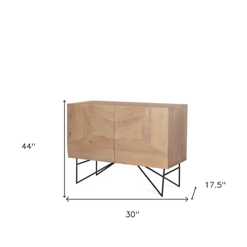 HomeRoots 44" Natural and Black Solid Wood and Metal Carved Geometric Accent Cabinet With Two Doors