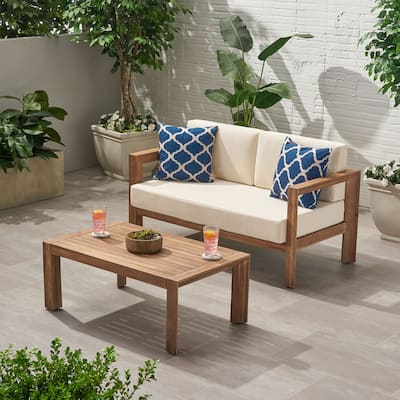 Roomfitters 2-Piece Outdoor Chat Set with Loveseat and Slatted Coffee Table, Cream Cushions and Acacia Wood Frame, Beige