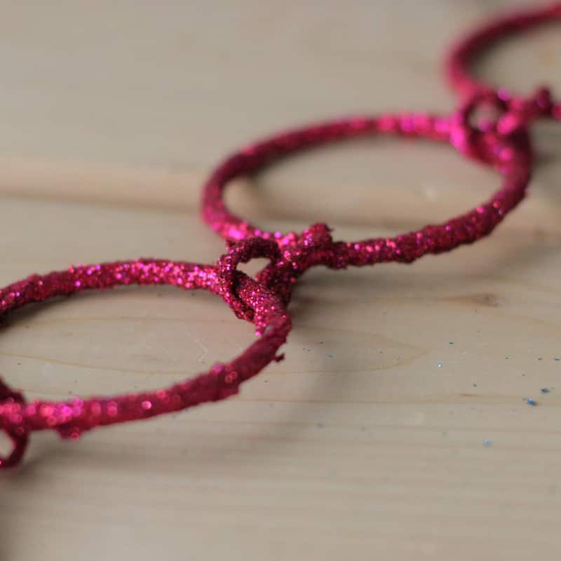 5' x 1.75" Pink Sparkling Glitter Round Circle Chain Artificial Christmas Garland - Unlit
