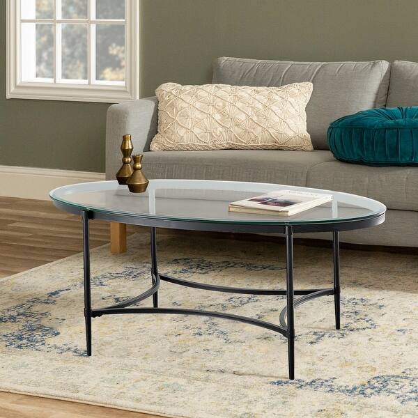 Featured image of post Contemporary Oval Glass Coffee Table : The tops are made of 12mm tempered glass with polished edges, resting on round chrome pucks.