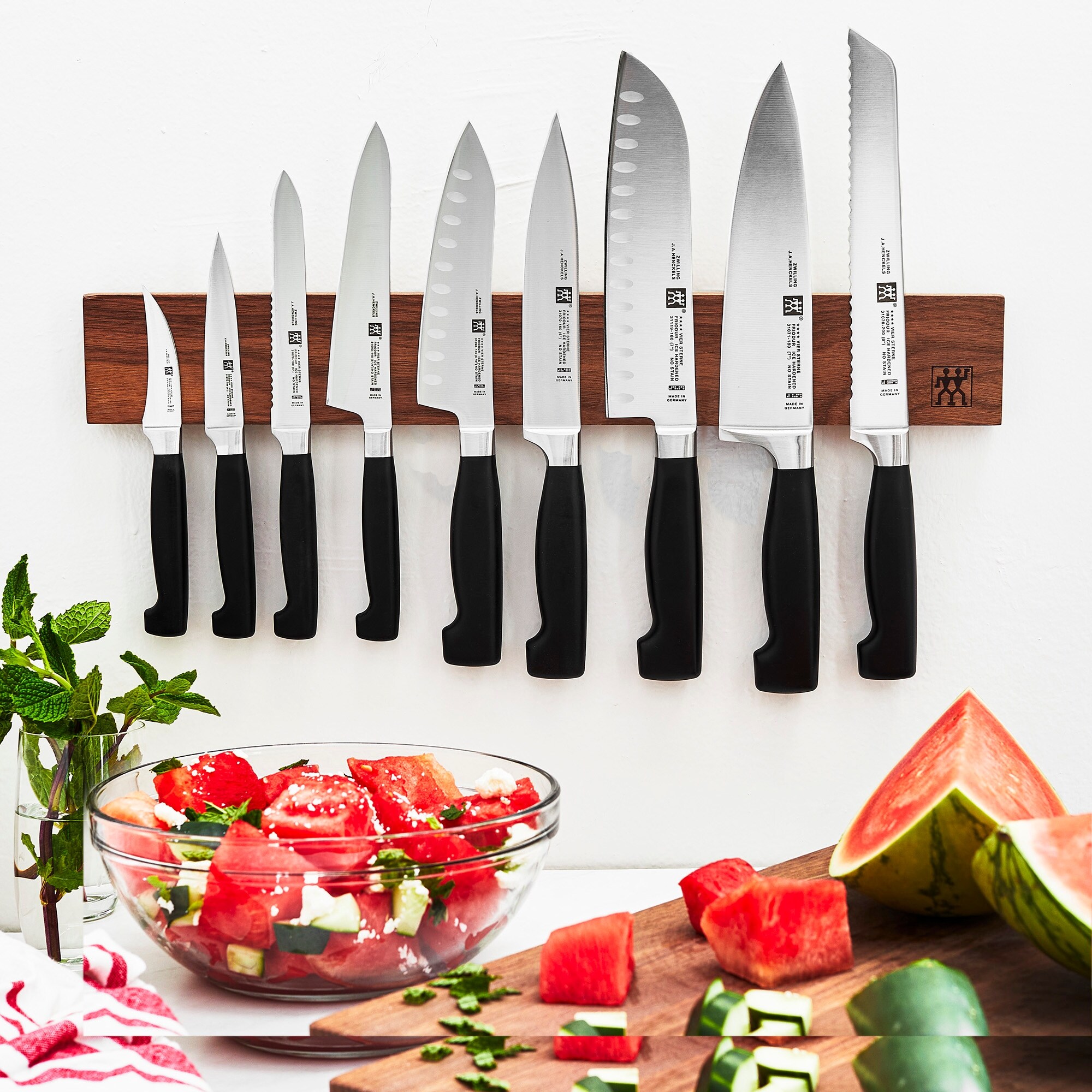 https://ak1.ostkcdn.com/images/products/is/images/direct/1fb26d2b734511fd24e54d8fface438399a17cc1/ZWILLING-Four-Star-Chef%27s-Knife.jpg