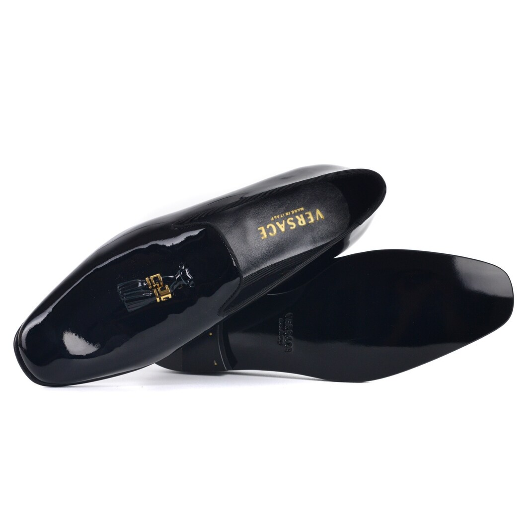 white and gold versace loafers