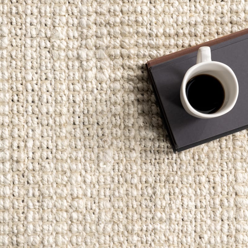 Nuloom Delilah Solid Chunky Jute Tassel Area Rug