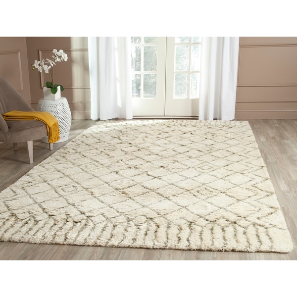 Safavieh Handmade Casablanca Shag Santina Tribal Wool Rug. Opens flyout.
