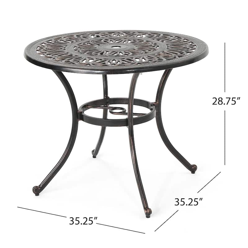 Roomfitters Outdoor Round Cast Aluminum Dining Table in Shiny Copper, Elegant Design with Intricate Patterns