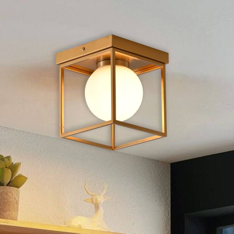 1-Light Brass Flush Mount With A White Glass Shade