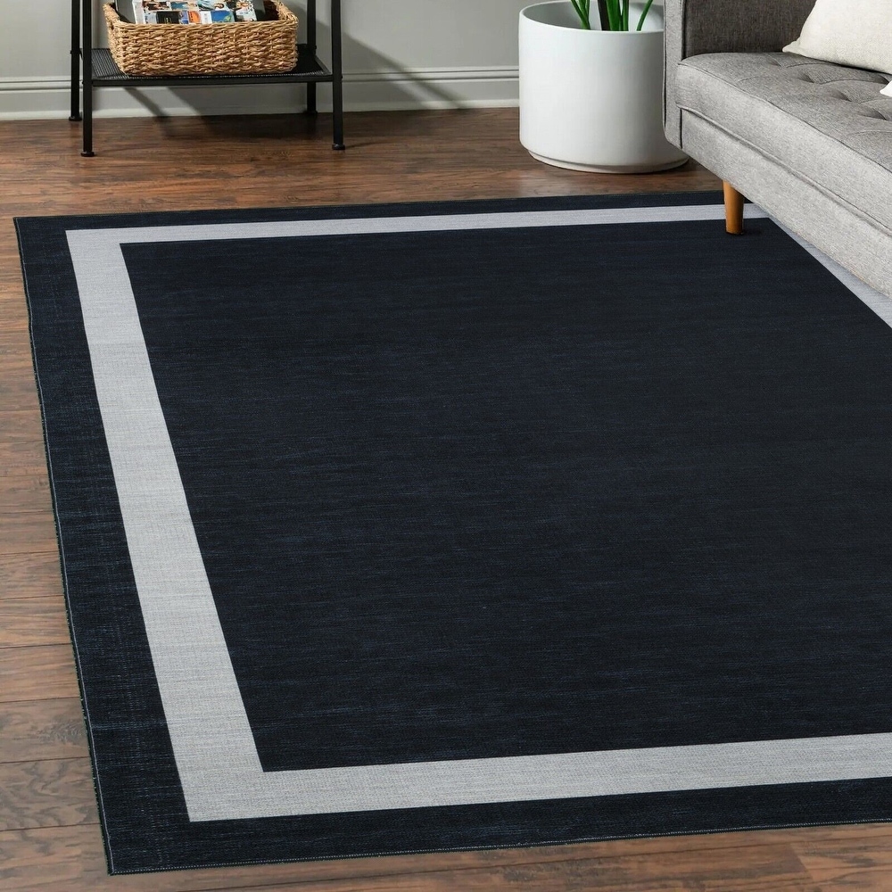 https://ak1.ostkcdn.com/images/products/is/images/direct/2009ed1fc70bed669a114803b7ea251049218442/Machine-Washable-Area-Rug-With-Non-Slip-Backing---Everest-Geometric-Modern-Border-Design.jpg
