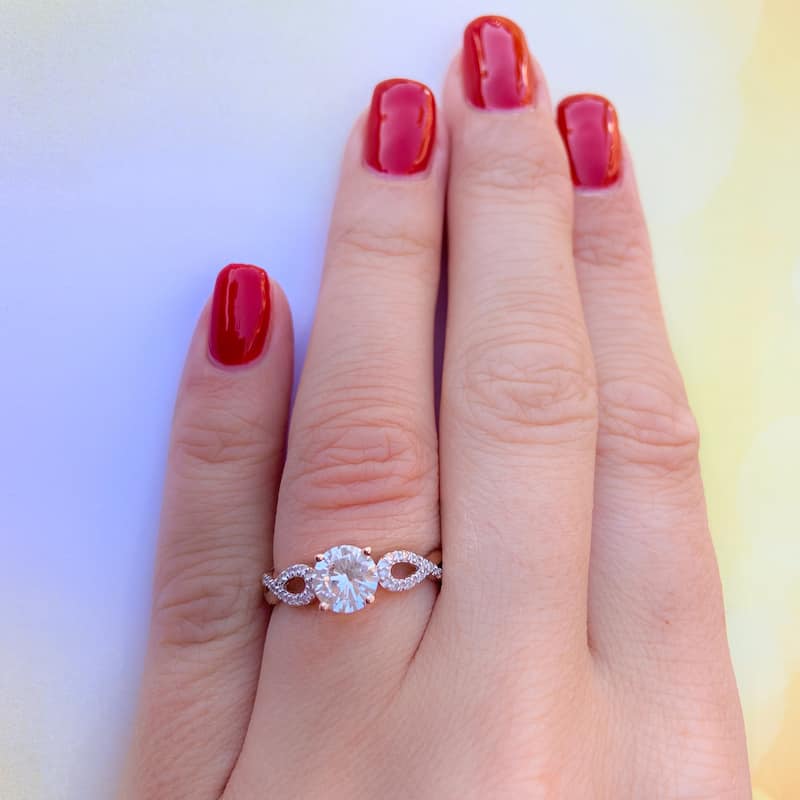 Miadora 10k Rose Gold Created White Sapphire 1/10ct TDW Diamond Infinity Engagement Ring