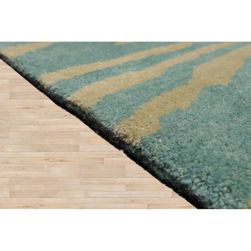 Hand Knotted Michaelian & Kohlberg Turquoise Tibetan Wool Area Rug - 5' x 8'