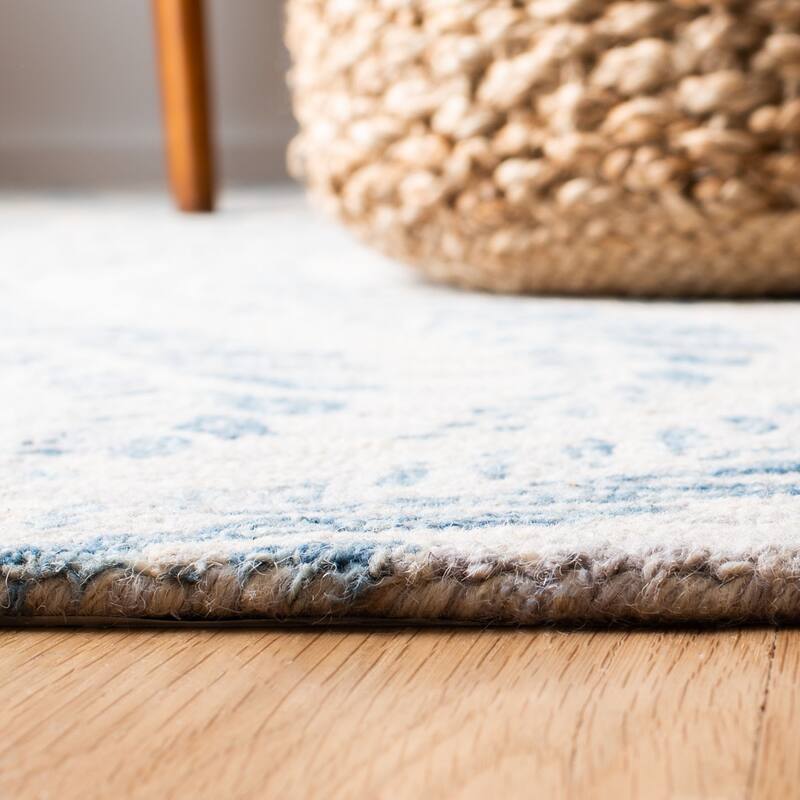 SAFAVIEH Handmade Micro-Loop Maele Modern Wool Rug