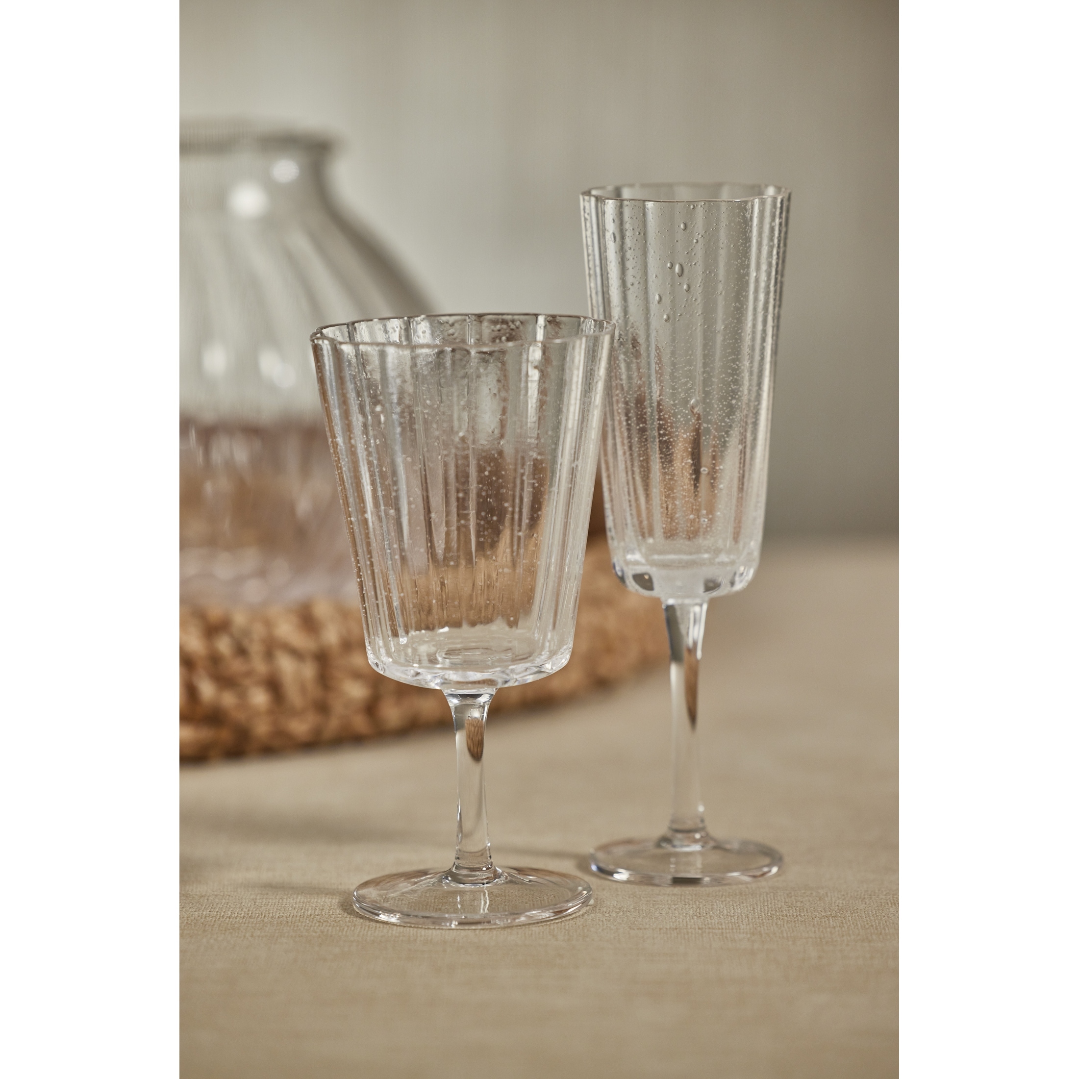 https://ak1.ostkcdn.com/images/products/is/images/direct/204be22e8e8f2a9ae5f9a1f2950b71b244a648c8/Forli-Bubble-Champagne-Flutes%2C-Set-of-4.jpg
